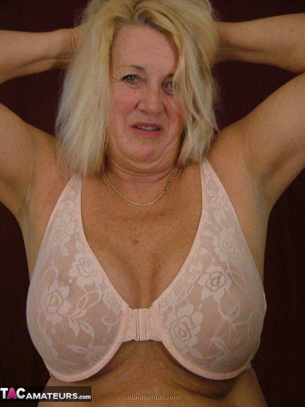 Mature amateur Adonna shows her large tits while trying on bras and panties - #14