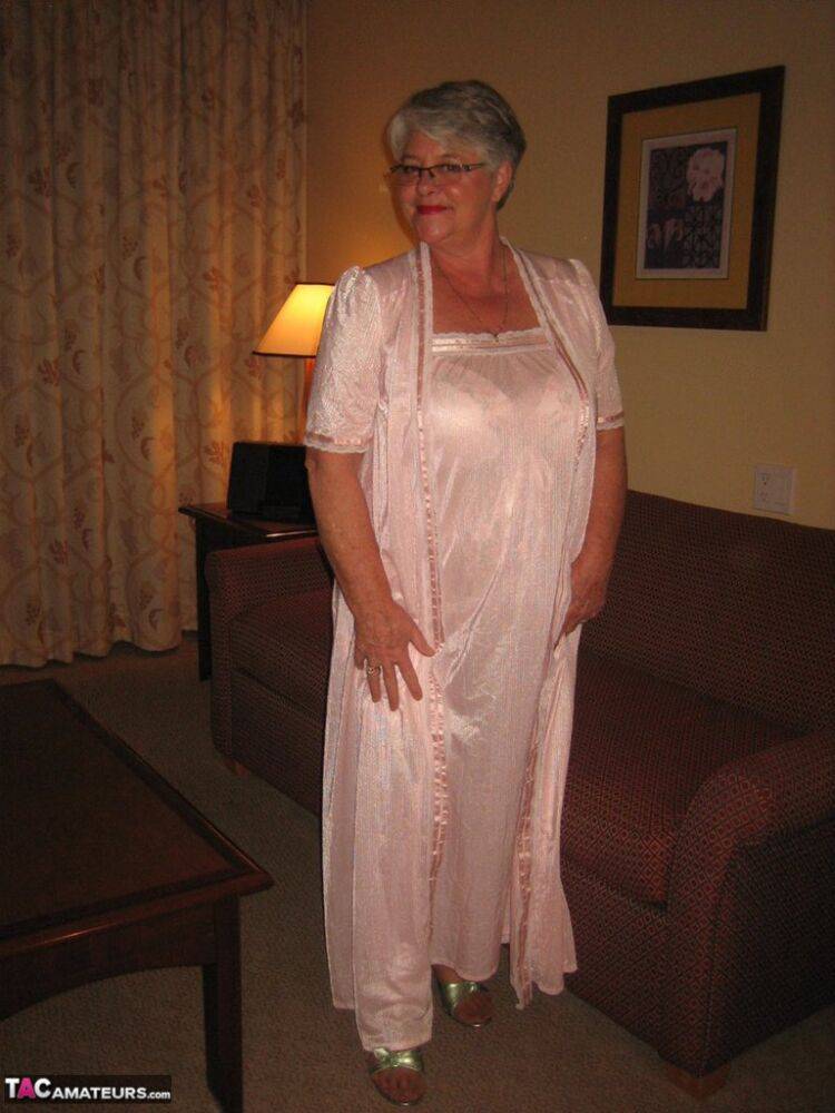 Amateur granny on the heavy side shows her pussy in lingerie and tan nylons - #13