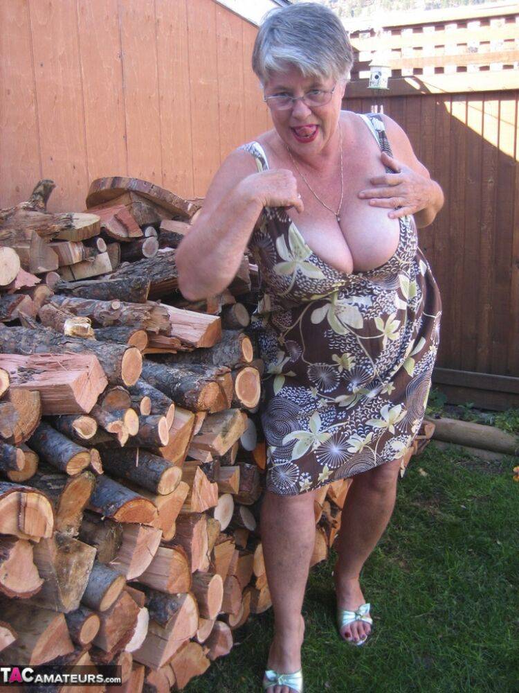 Brazen older granny strips off by the wood pile to show off BBW tits & big ass - #5