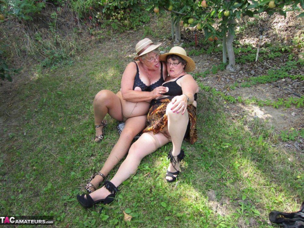 Older granny Girdle Goddess & her aged gal pal showing ass & nipples outdoors - #9