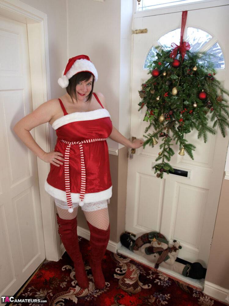 Overweight amateur Roxy looses her huge boobs while wearing Christmas apparel - #11