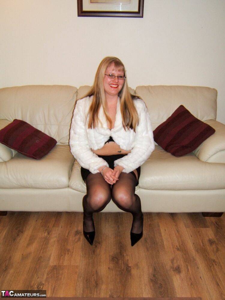 Natural blonde Tabitha displays her large tits and pussy in glasses and nylons - #10