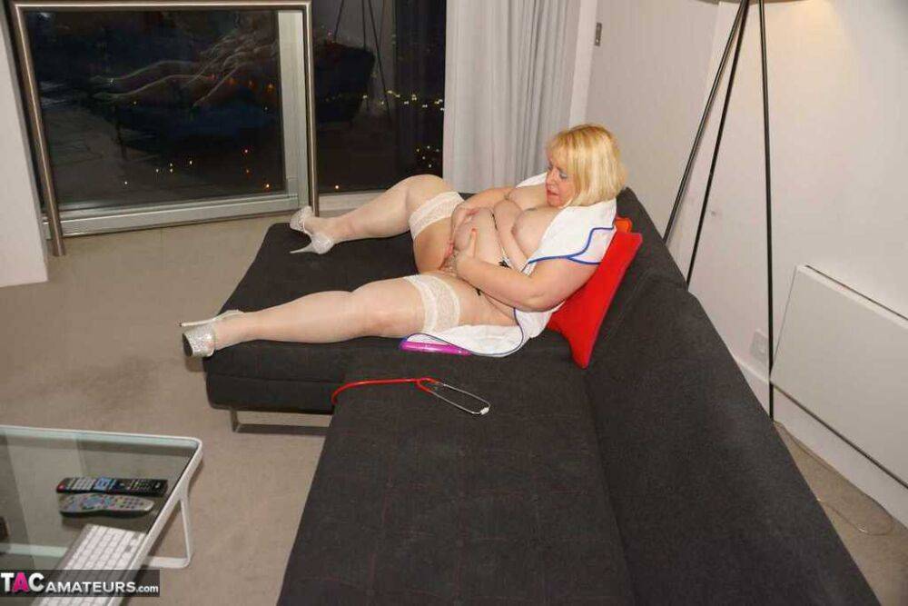 Obese blonde nurse Lexie Cummings masturbates on a sofa with a vibrator - #13