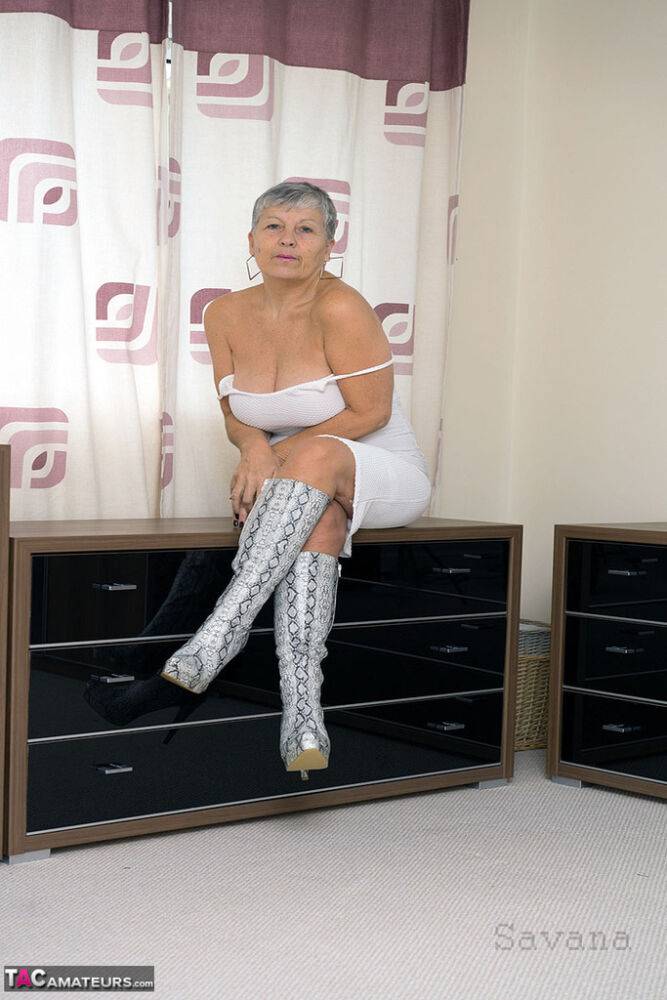 Fun loving hot granny Savana squats to flash naked upskirt in high heel boots - #4