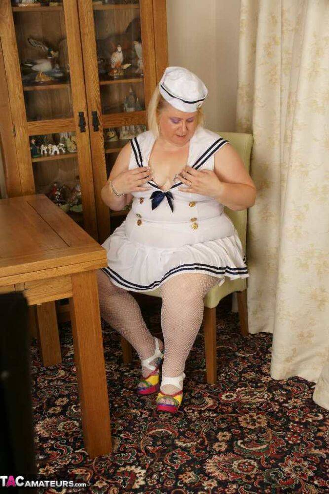 Blonde BBW Lexie Cummings plays with her pierced pussy in a sailor uniform | Photo: 4378298