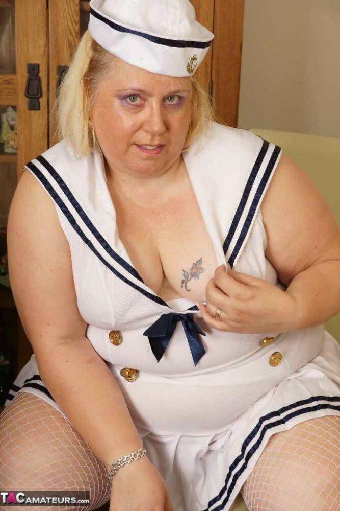 Blonde BBW Lexie Cummings plays with her pierced pussy in a sailor uniform | Photo: 4378351