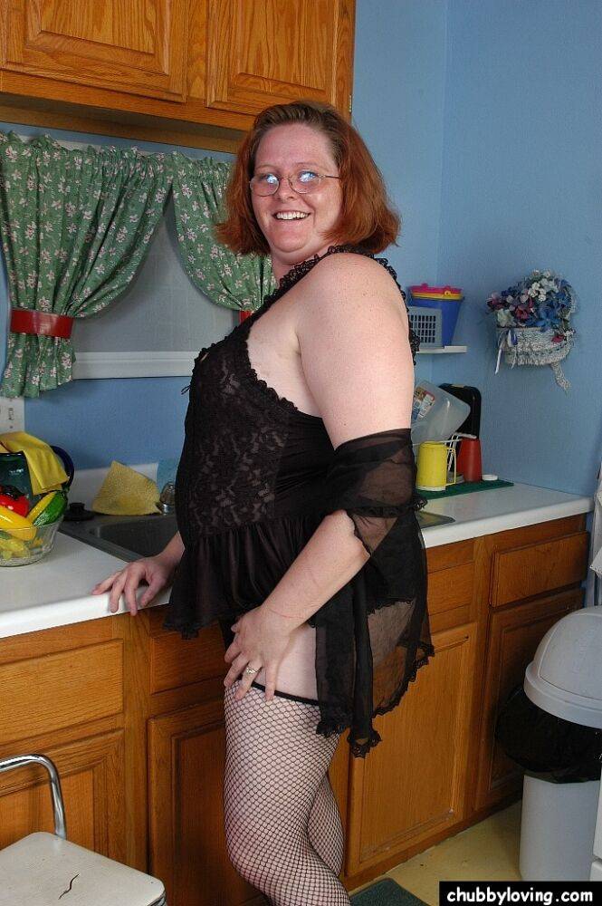 Fat redhead mature MILF Adrienne showcasing her big ass in stockings - #5