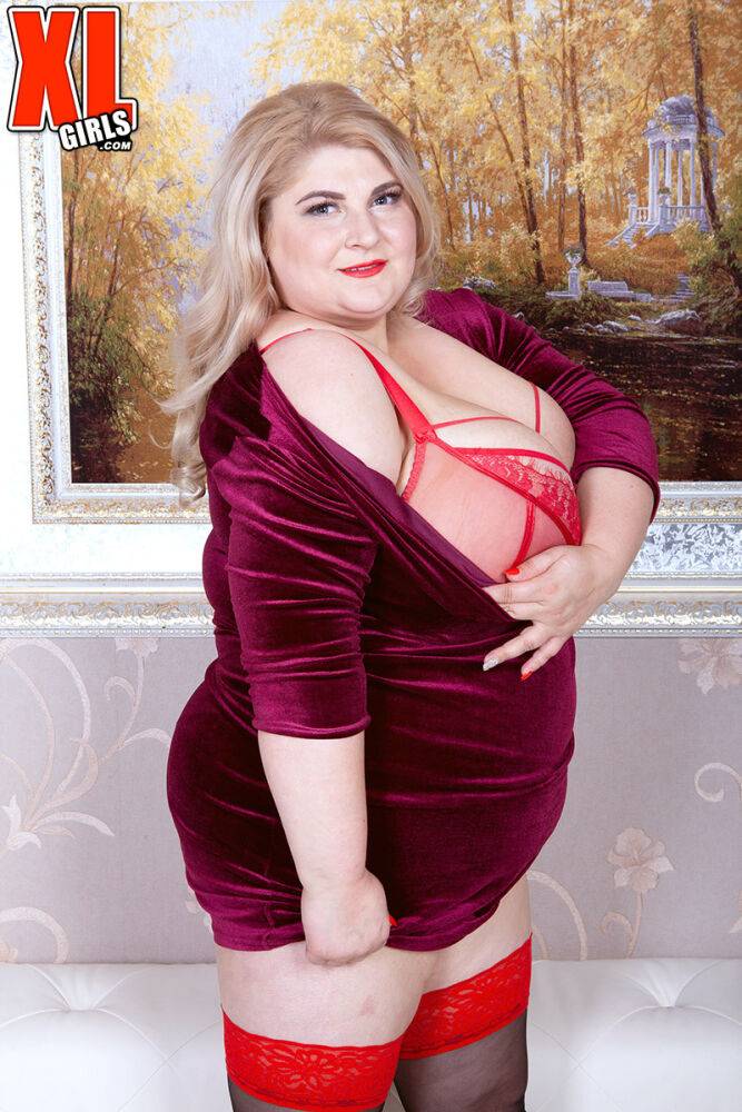 Blonde BBW Halina removes a velour dress while getting bare naked - #14