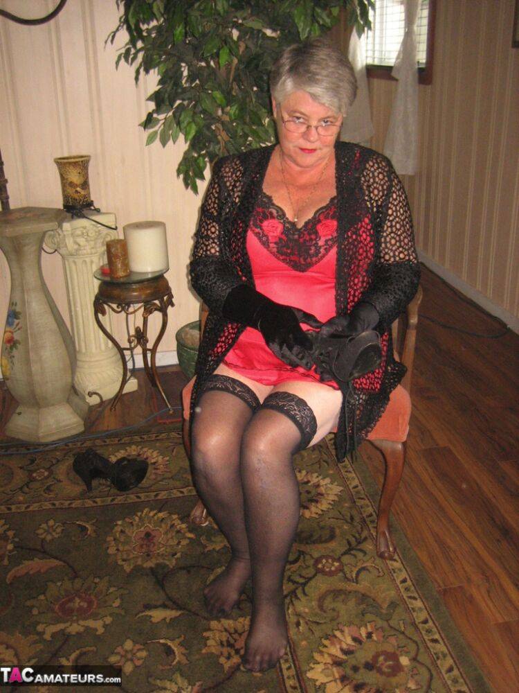 Old lady Girdle Goddess casts off lingerie to pose nude in hosiery and gloves - #10