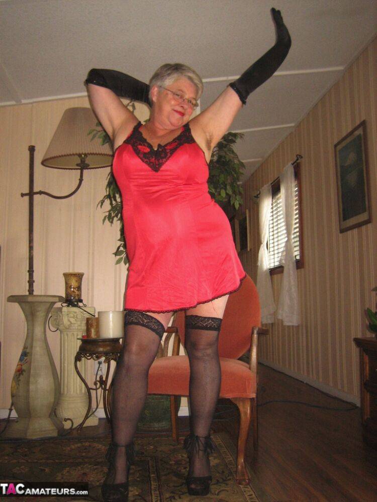 Old lady Girdle Goddess casts off lingerie to pose nude in hosiery and gloves - #6