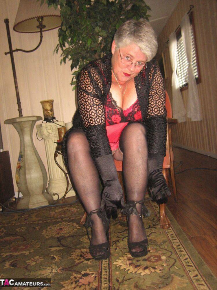 Old lady Girdle Goddess casts off lingerie to pose nude in hosiery and gloves - #14