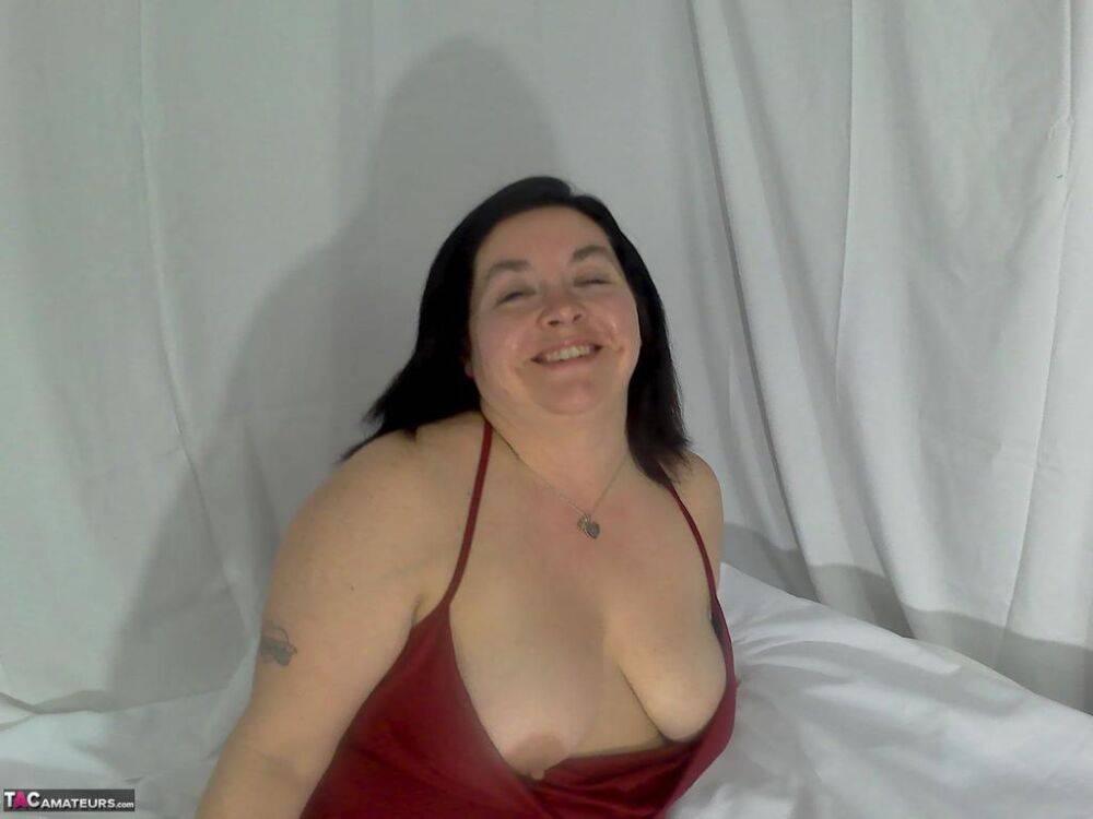 Amateur BBW removes printed underwear to get naked on her bed - #11