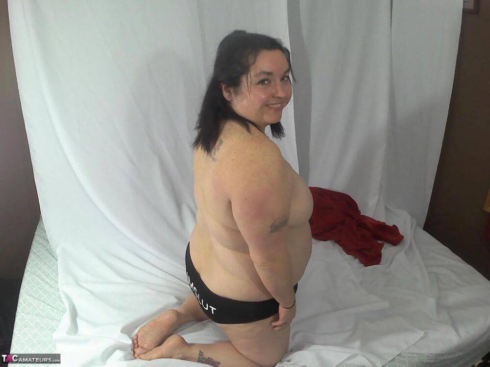 Amateur BBW removes printed underwear to get naked on her bed - #6