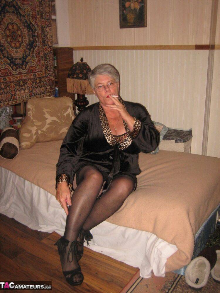 Silver haired granny Girdle Goddess masturbates on her bed in stockings - #4