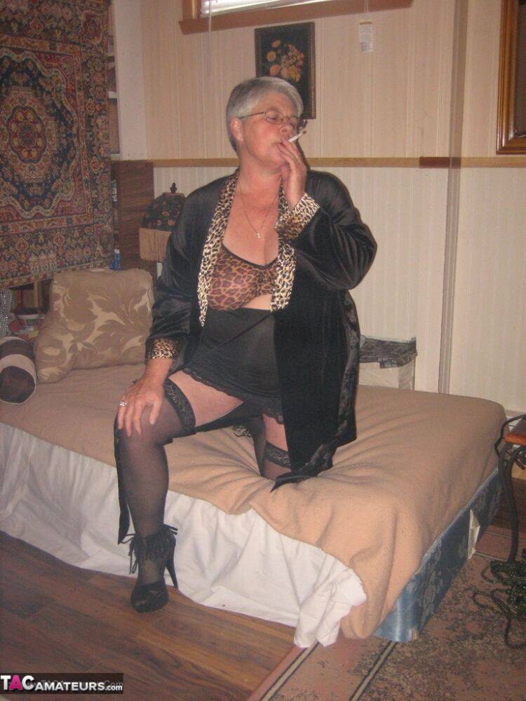 Silver haired granny Girdle Goddess masturbates on her bed in stockings - #1