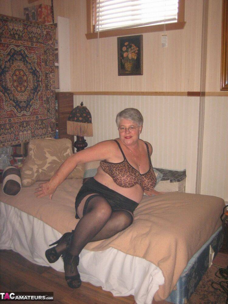 Silver haired granny Girdle Goddess masturbates on her bed in stockings - #6