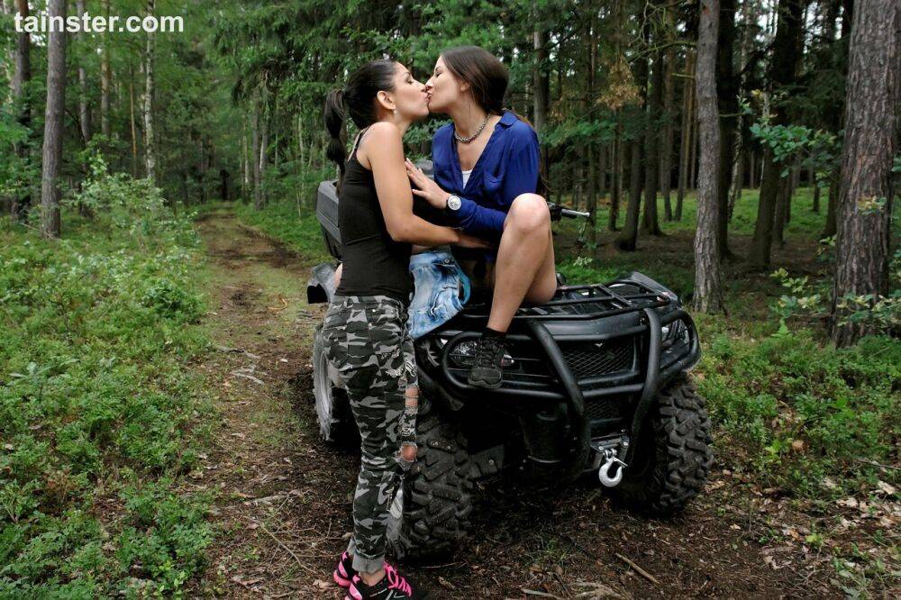 Brunette chicks take an ATV into the woods to explore lesbian sex - #1