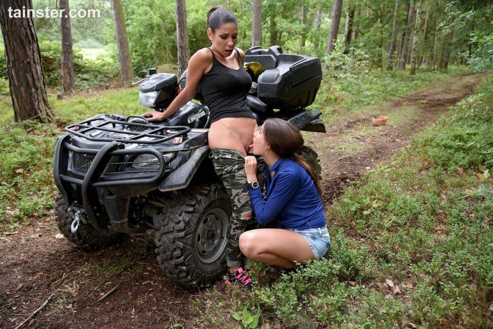 Brunette chicks take an ATV into the woods to explore lesbian sex - #13