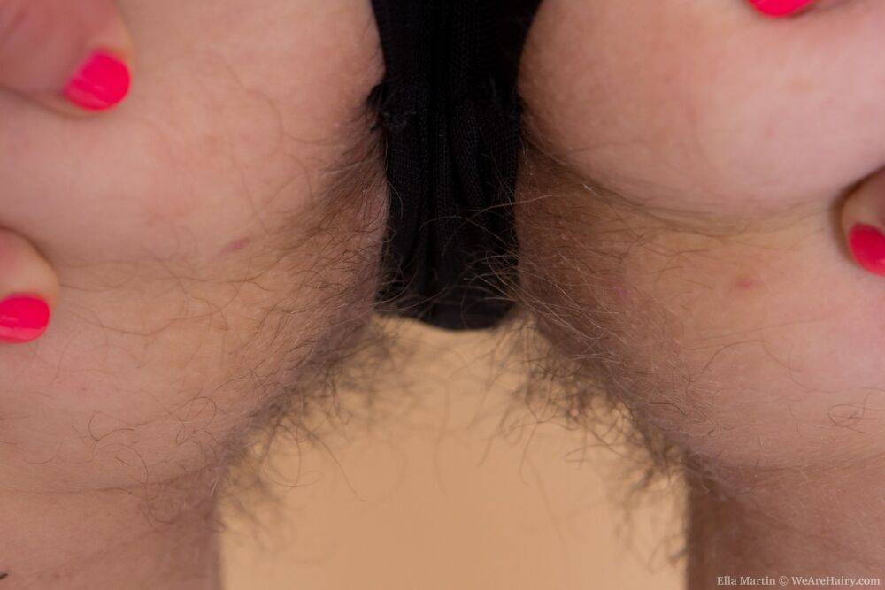 Dark haired amateur stretches out her hairy muff during a closeup - #12