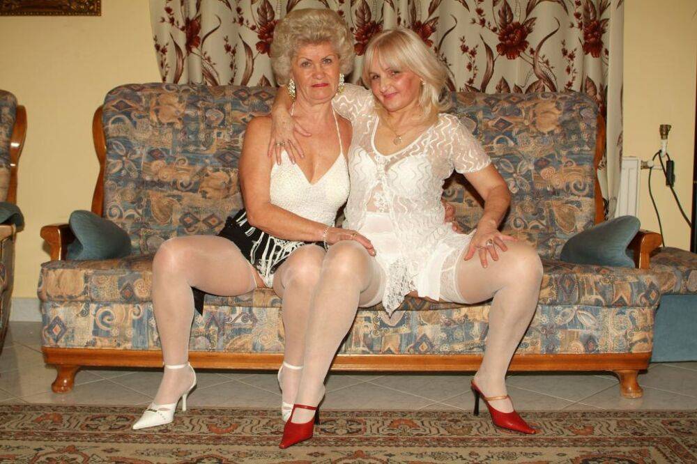 Blonde grandmothers engage in lesbian foreplay on a chesterfield - #3