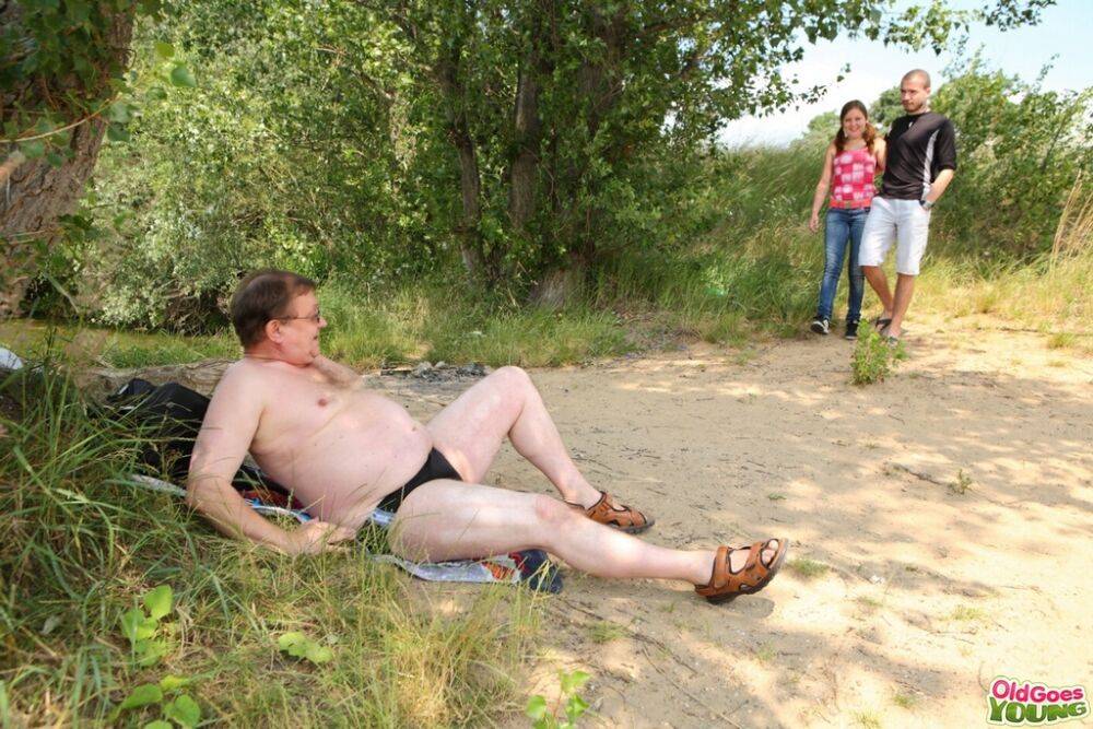 Young girl gets cum on tits after sex with a fat old man beside a dirt road | Photo: 4624650