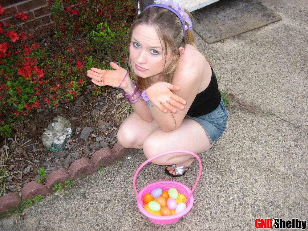 Charming young girl exposes a nipple while collecting Easter eggs - #8