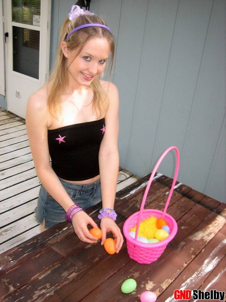 Charming young girl exposes a nipple while collecting Easter eggs - #7