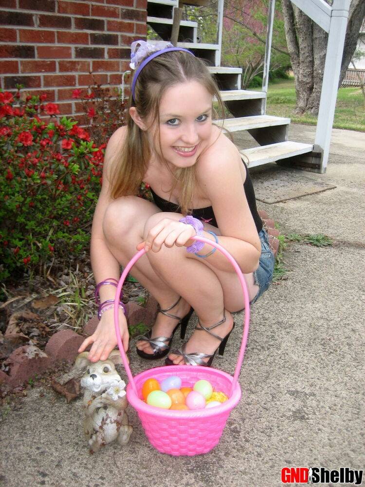 Charming young girl exposes a nipple while collecting Easter eggs - #3