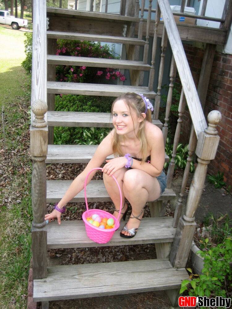 Charming young girl exposes a nipple while collecting Easter eggs - #10