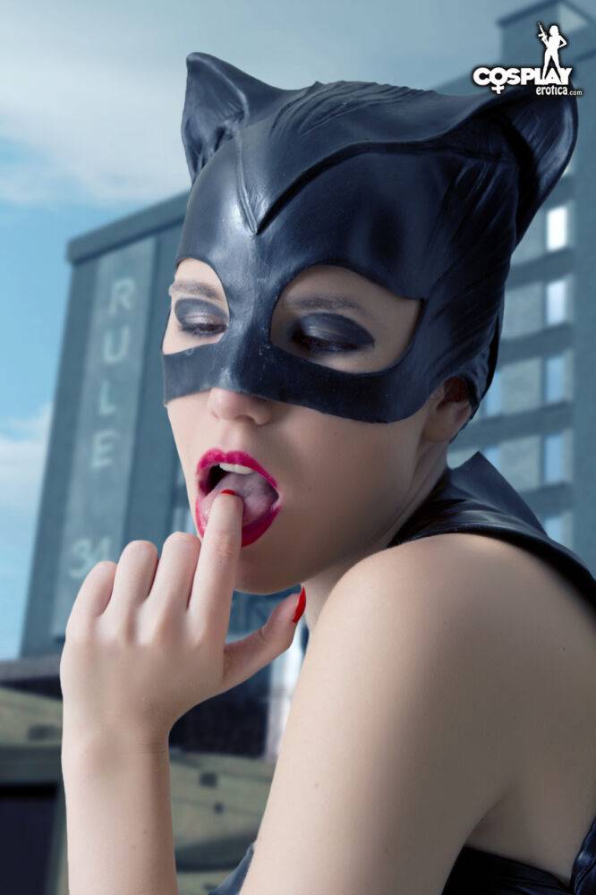 Beautiful girl gets naked in a leather Catwoman hood on a rooftop - #11