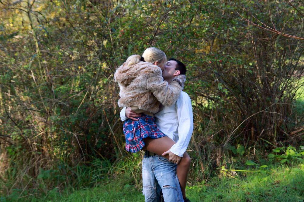 Young blonde and her boyfriend have sex in the middle of a field of crops - #3