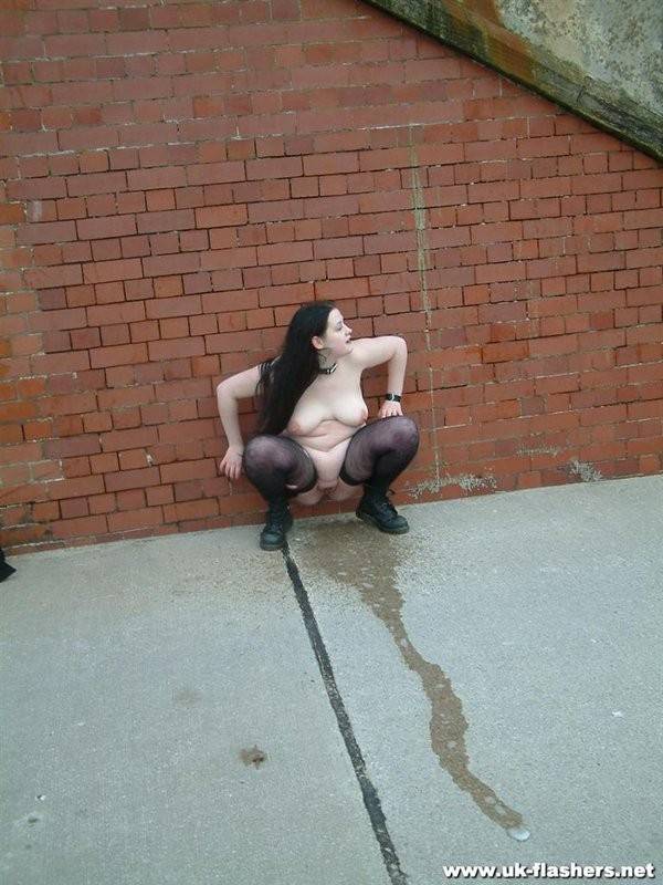 Hot brunette taking a piss in the street - #8