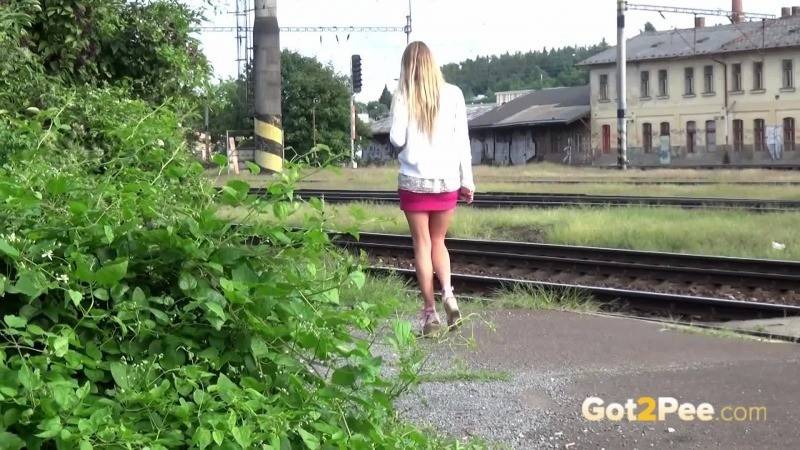 Pretty blonde pees on a train platform - #15