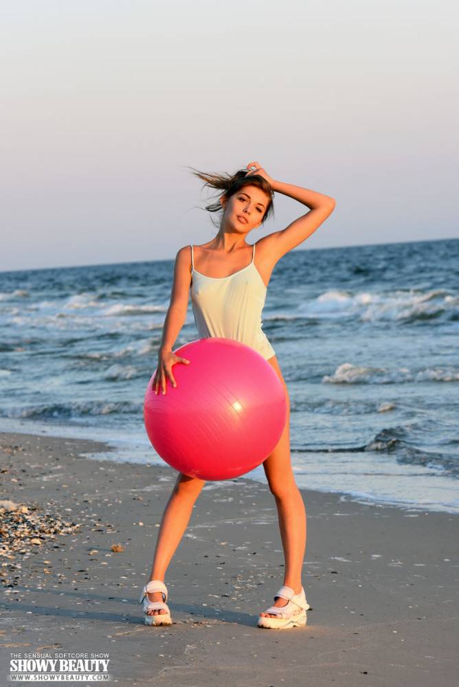 Posing on a sandy shore - #1