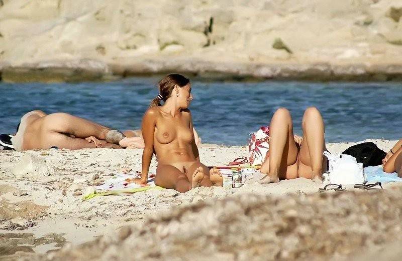 Naked teens play together at a public beach - #5