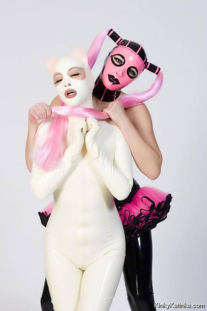 Two babes wearing kinky latex outfits - #3