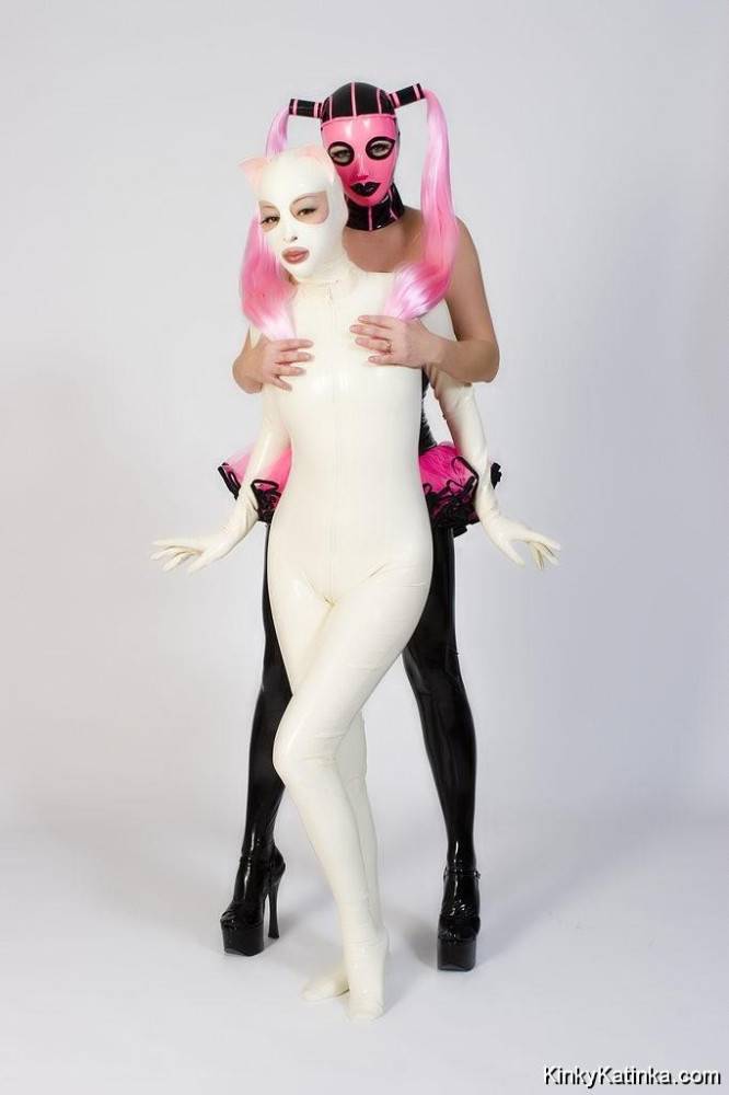 Two babes wearing kinky latex outfits - #1