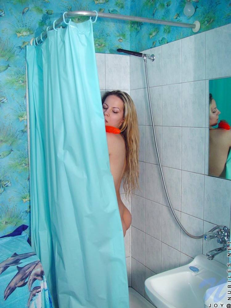 There Is A Sexy And Natural Look To Joy Nubiles As She Poses Naked In The Shower. - #12