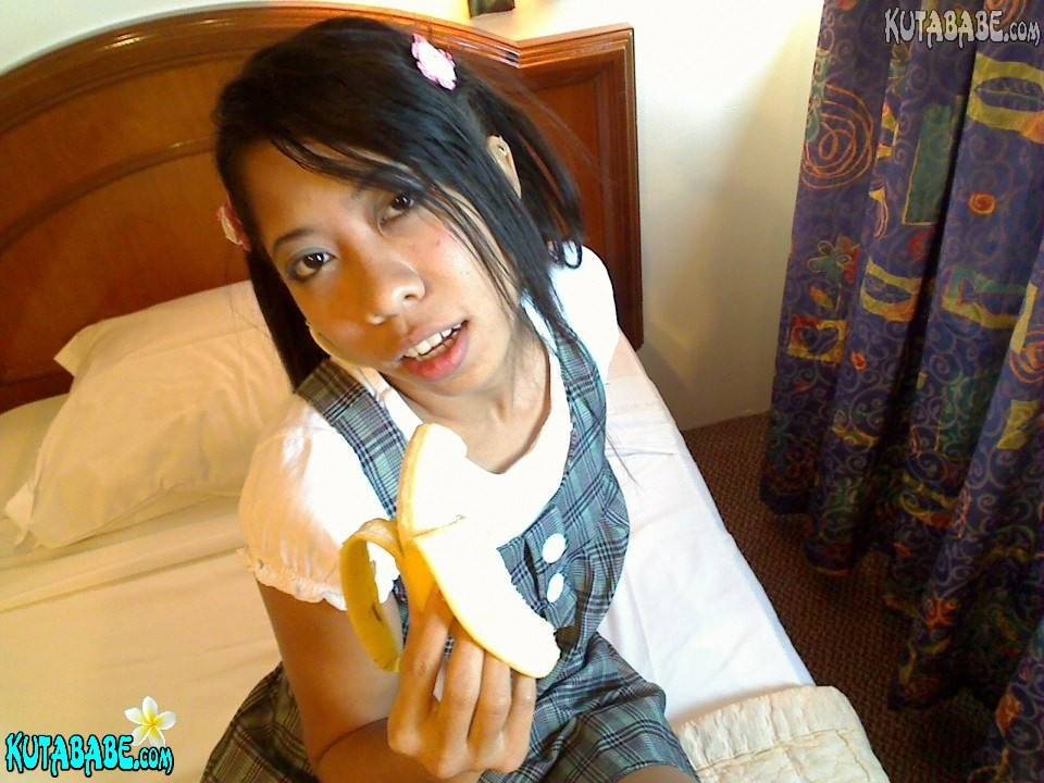 Asian bali teen girl blows banana - #4