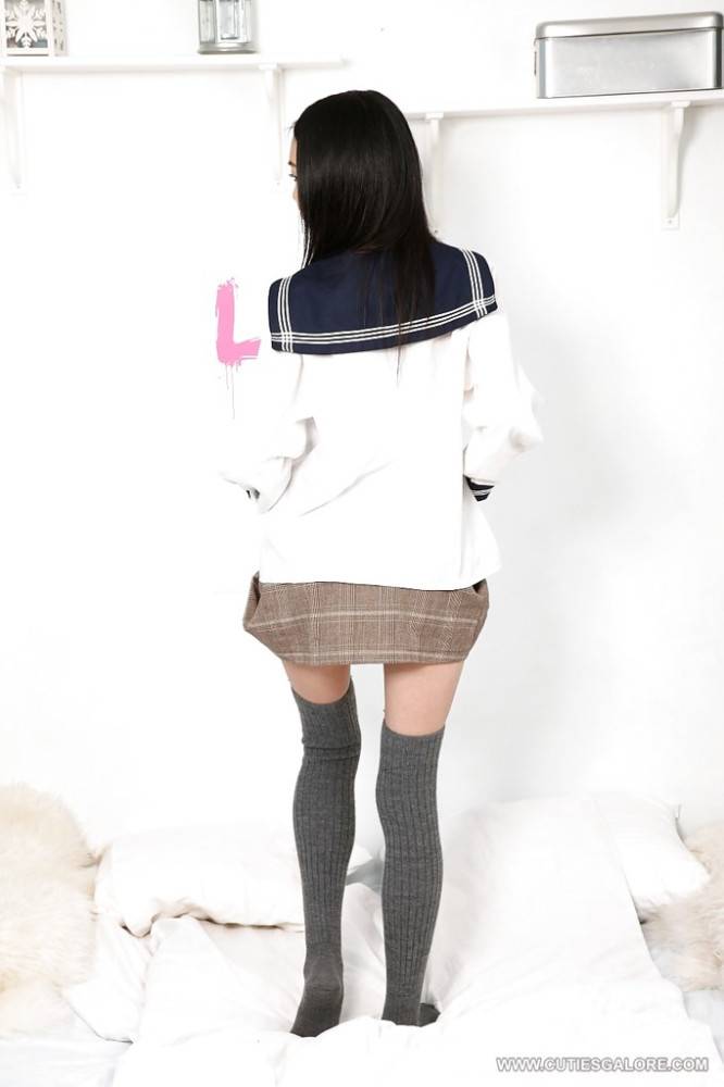 Very attractive asian teen Yiki in uniform outfit reveals her ass - #5