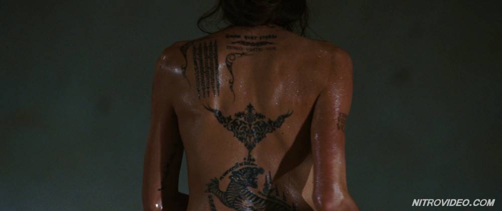 Angelina jolie exposing her hot tattooed body - #6