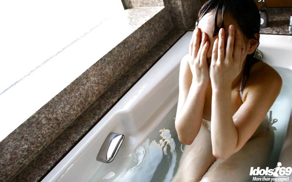 Stunning japanese teen Hina Tachibana exposes big tits and hot butt in the bathroom - #11