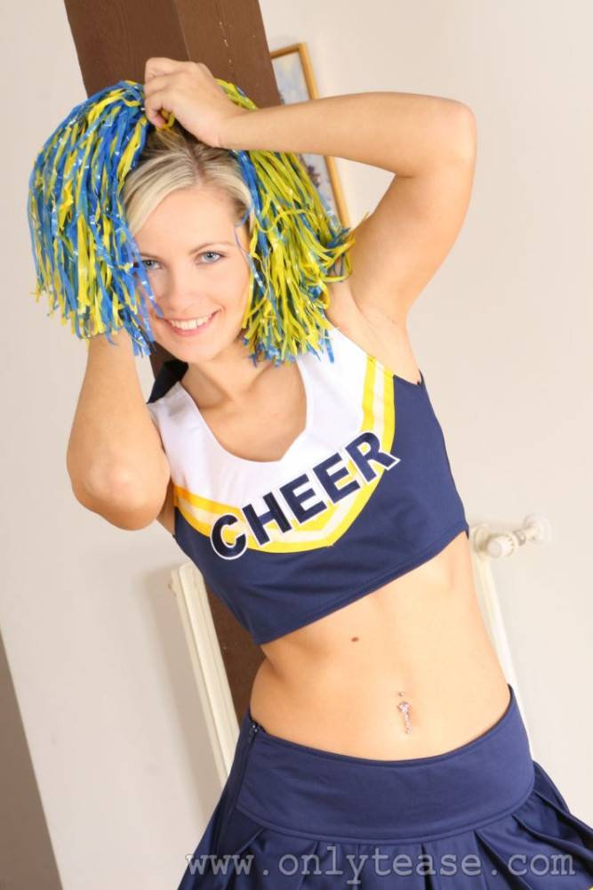 Playful Cheerleader Jenni Peels Off Her Top And Panties While Dancing Indoors. - #5