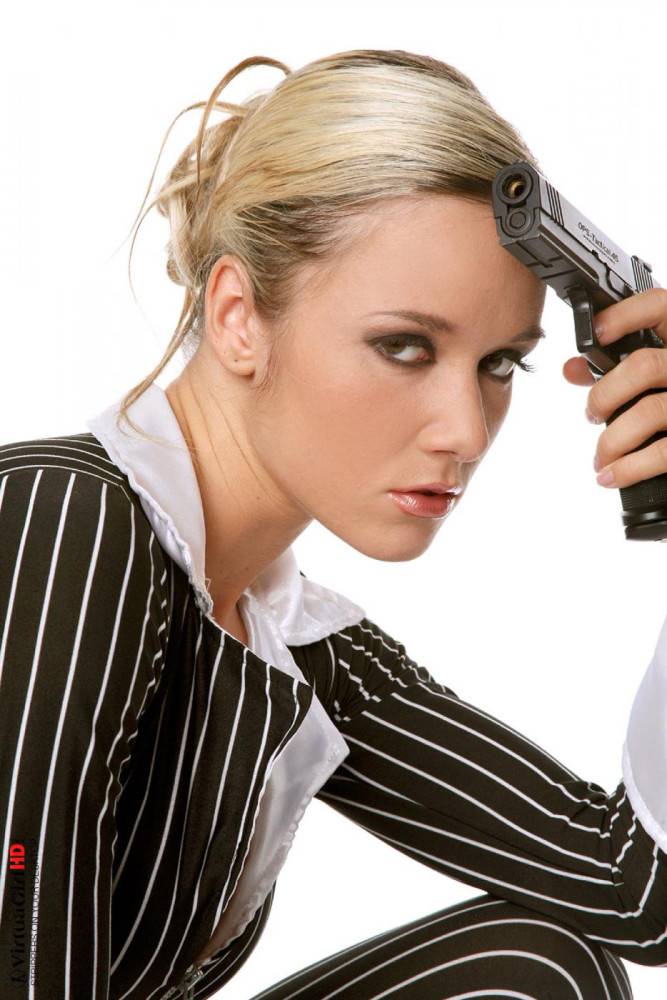 The Blonde Girl Carmen Cocks Has Lost Off Her Striped Costume And Posed With The Gun - #14
