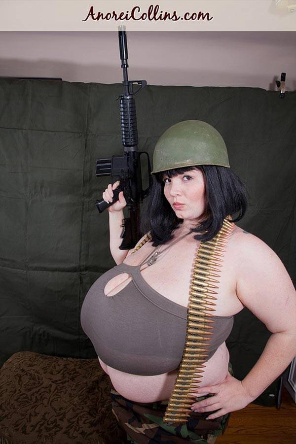 Army fat woman Anorei Collins playing with her massive guns - #4
