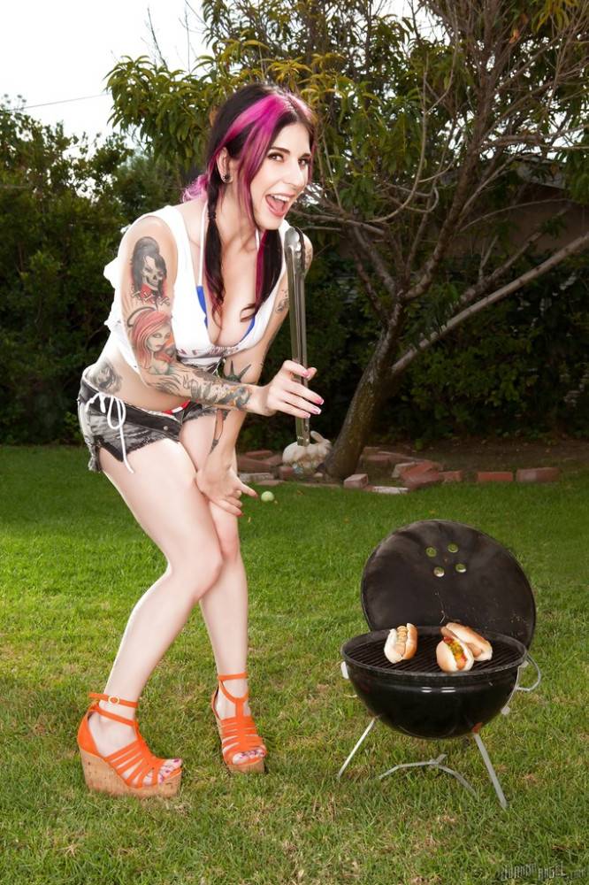 Stunning american milf Joanna Angel in fancy shorts exhibiting her ass and spreading her legs outdoor - #7