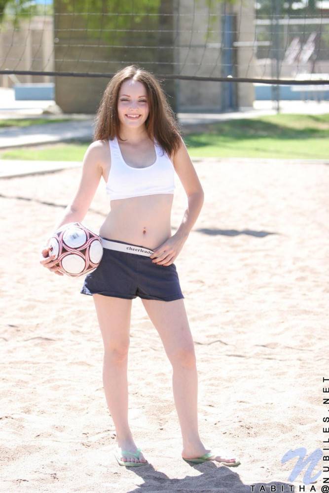 Smiling Sportive Girl Tabitha Nubiles In Snow White Top And Blue Shorts Poses With A Ball Outside - #15