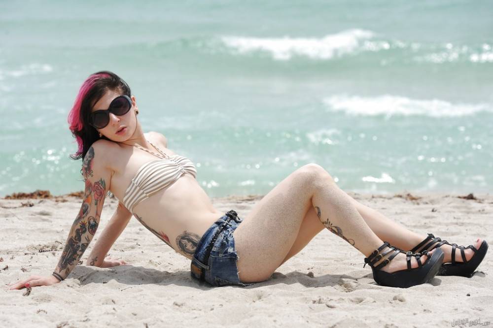 Hot american cutie Joanna Angel uncovering small tits and sexy butt on the beach - #1