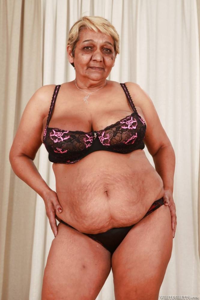 Plump grandma Evika in sexy underwear exposing big knockers and spreading her legs - #5