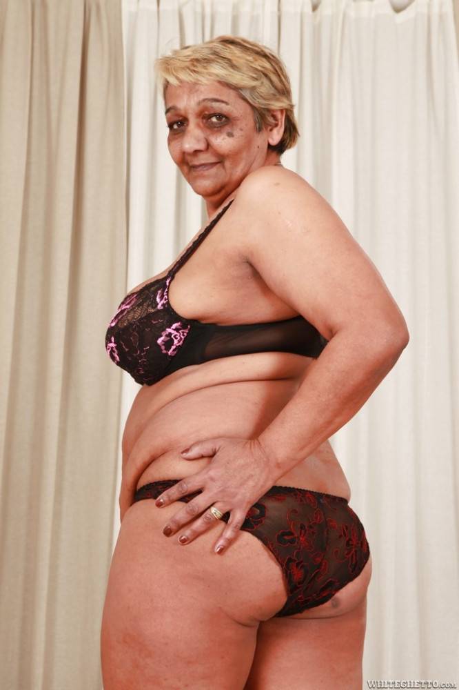 Plump grandma Evika in sexy underwear exposing big knockers and spreading her legs - #7